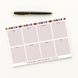 Tay Weekly planner pad with colorful border and pen on a white background