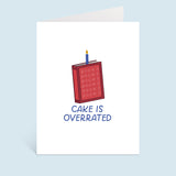 Books Over Cake Greeting Card