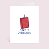 Books Over Cake Greeting Card