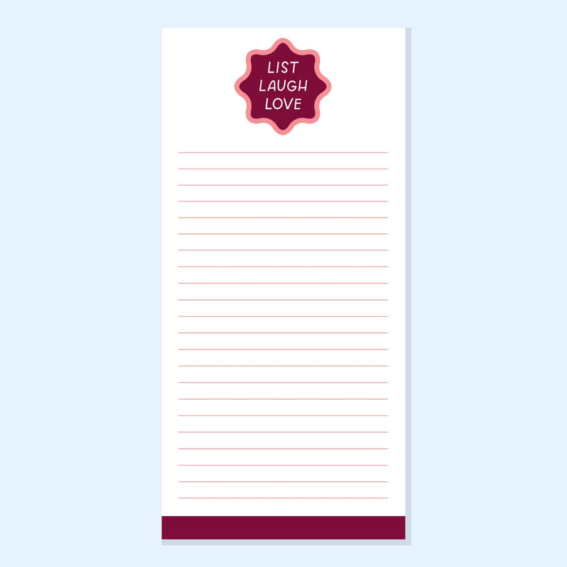 Notepad with a red label reading 'List Laugh Love' on a light blue background